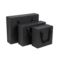 Afbeelding Magneetdozen - zwart met draaglint